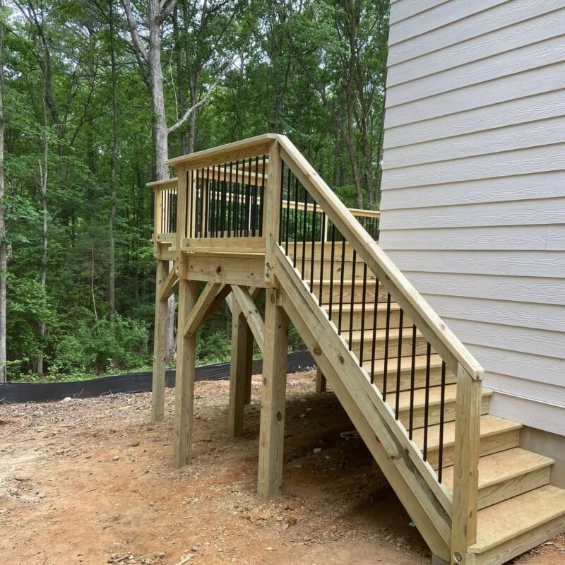 Elevated deck with metal railing