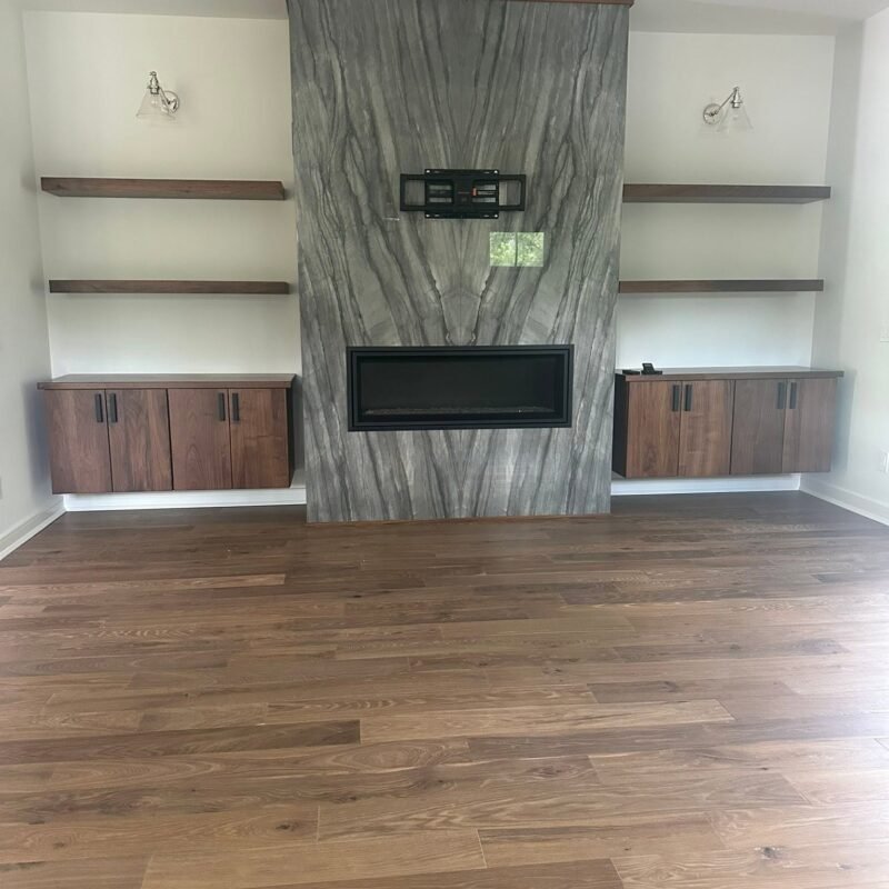 Stone fireplace with custom built ins